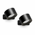 Kit com 2 arandelas LED Aura Duo pretas em fundo branco