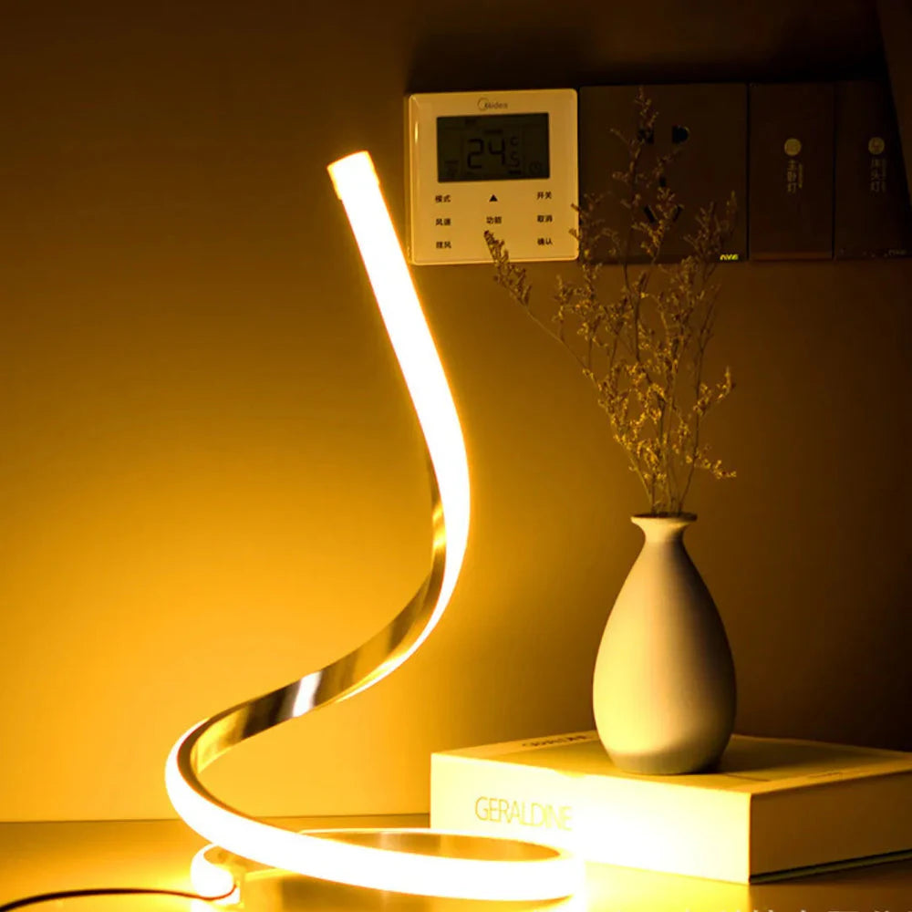Luminária Onda Luminosa dourada com luz quente
